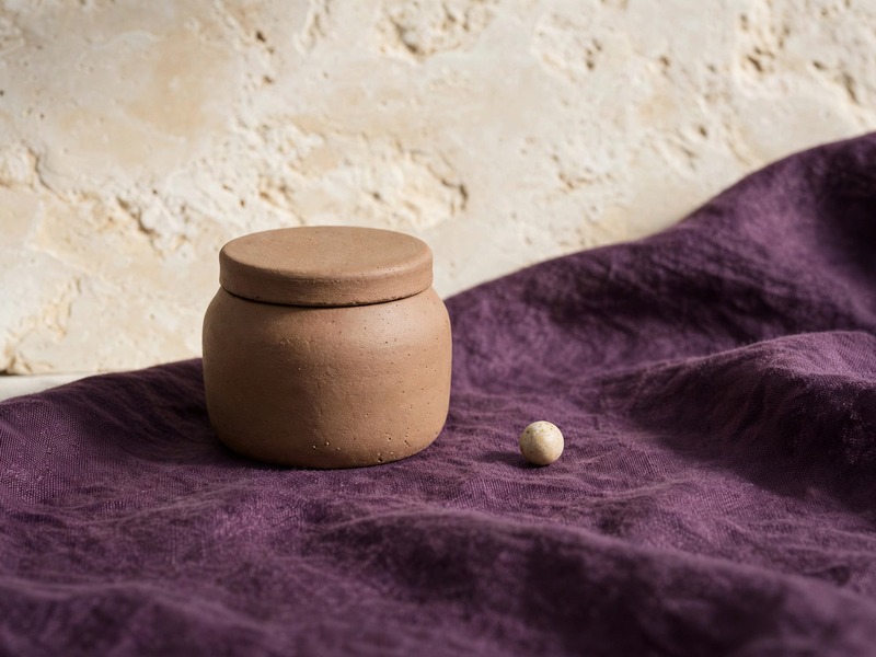 A closed clay storage jar